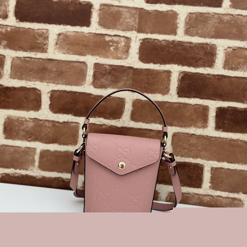 G*u*i top handle bags